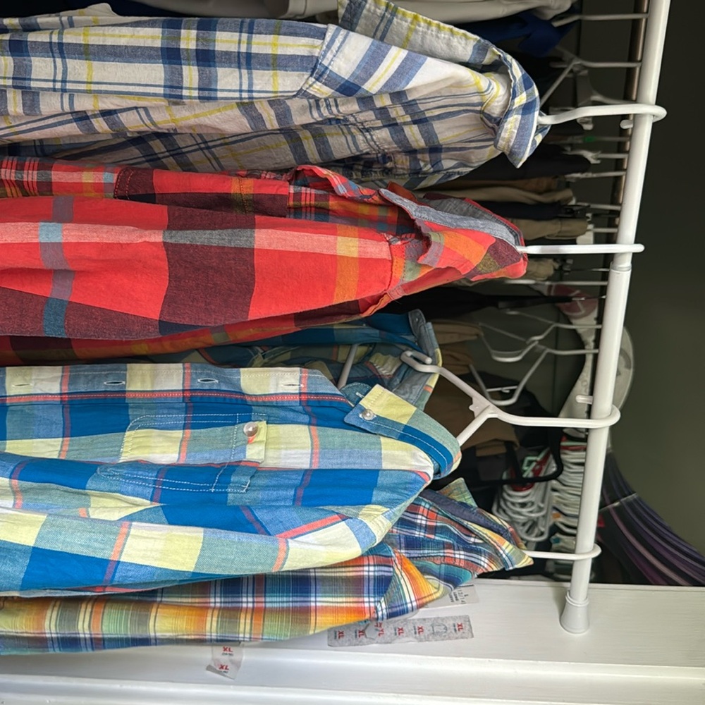 Four Fun colorful plaid button down shirts.